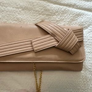 Cute light pink handbag with gold chain
